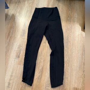 Black Lululemon leggings with cutouts